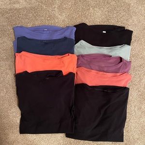 Eight authentic women’s Lululemon “Back In Action” short sleeve tops!